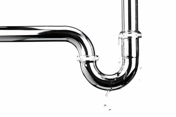 Leaking of water from stainless steel sink pipe on isolated on white background